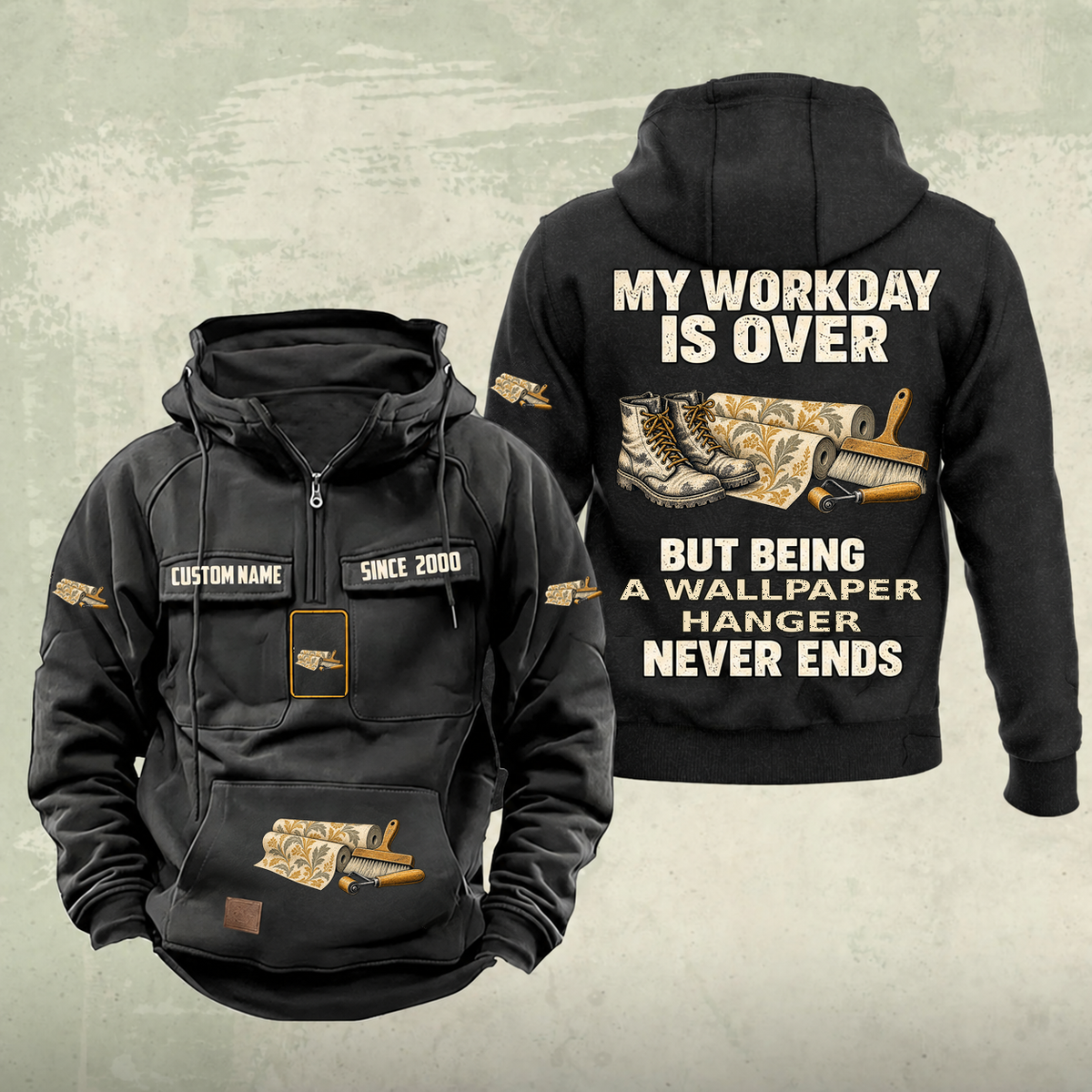 Wallpaper Hanger Never Ends Vintage Hoodie in Black, front and back, with work boots and wallpaper rolls, a smoothing brush and seam roller, matching sleeve, chest and pocket motifs, and illustrative CUSTOM NAME and SINCE 2000 text.