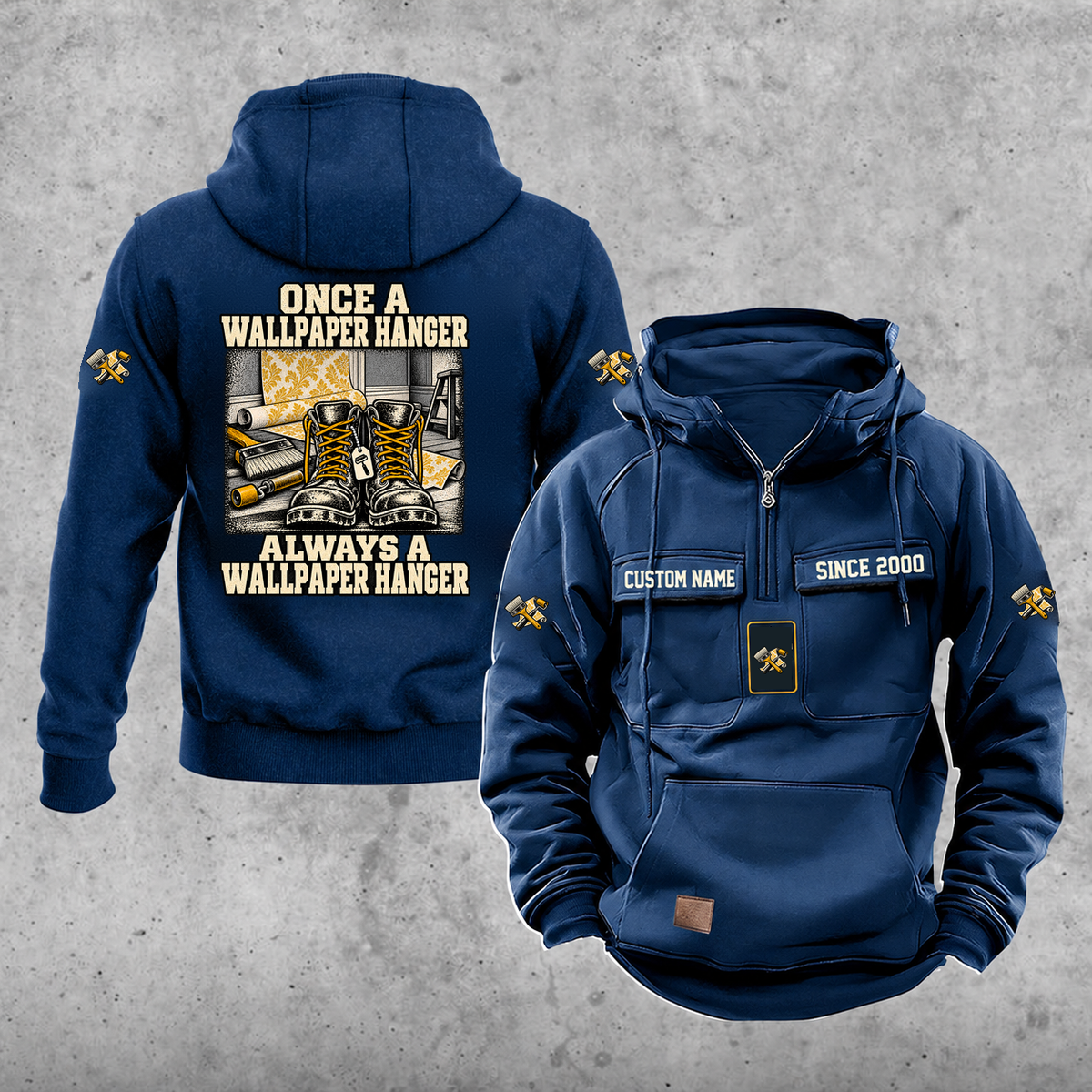 Wallpaper Hanger Once and Always Vintage Hoodie in Dark Blue, front and back views with work boots and wallpaper rolls, a smoothing brush and a seam roller, coordinated sleeve and chest emblems, and illustrative sample text CUSTOM NAME and SINCE 2000.