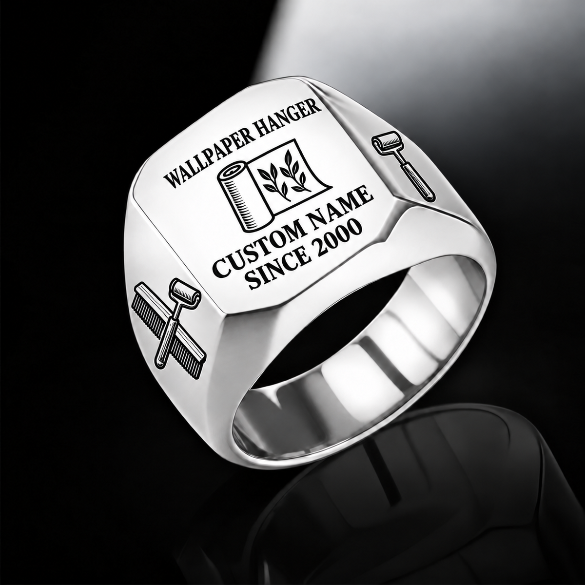 Silver-finish Wallpaper Hanger Signature Crest signet ring with partly unfurled leaf-pattern wallpaper, wallpaper brush and seam-roller shoulder engraving, and illustrated CUSTOM NAME and SINCE 2000 text