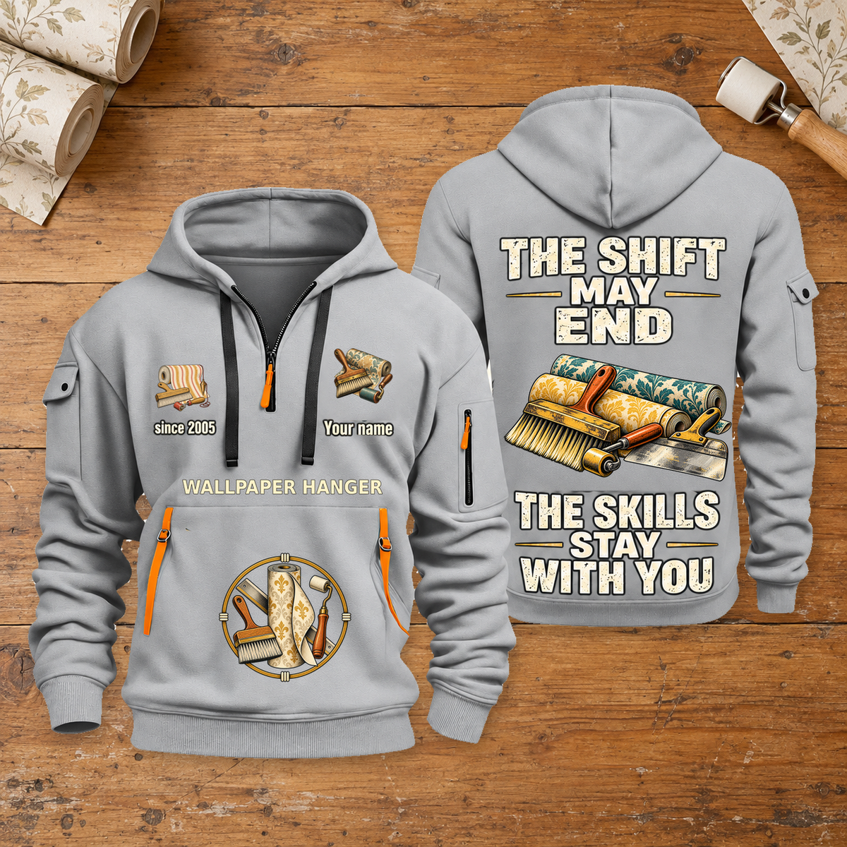 Wallpaper Hanger Skills Stay With You Quarter-Zip Hoodie in Light Grey, full authentic front and back views with matching wallpaper hanger tools and equipment artwork, original sample name/year and Skills Stay With You slogan. On a wallpaper hanger workbench.