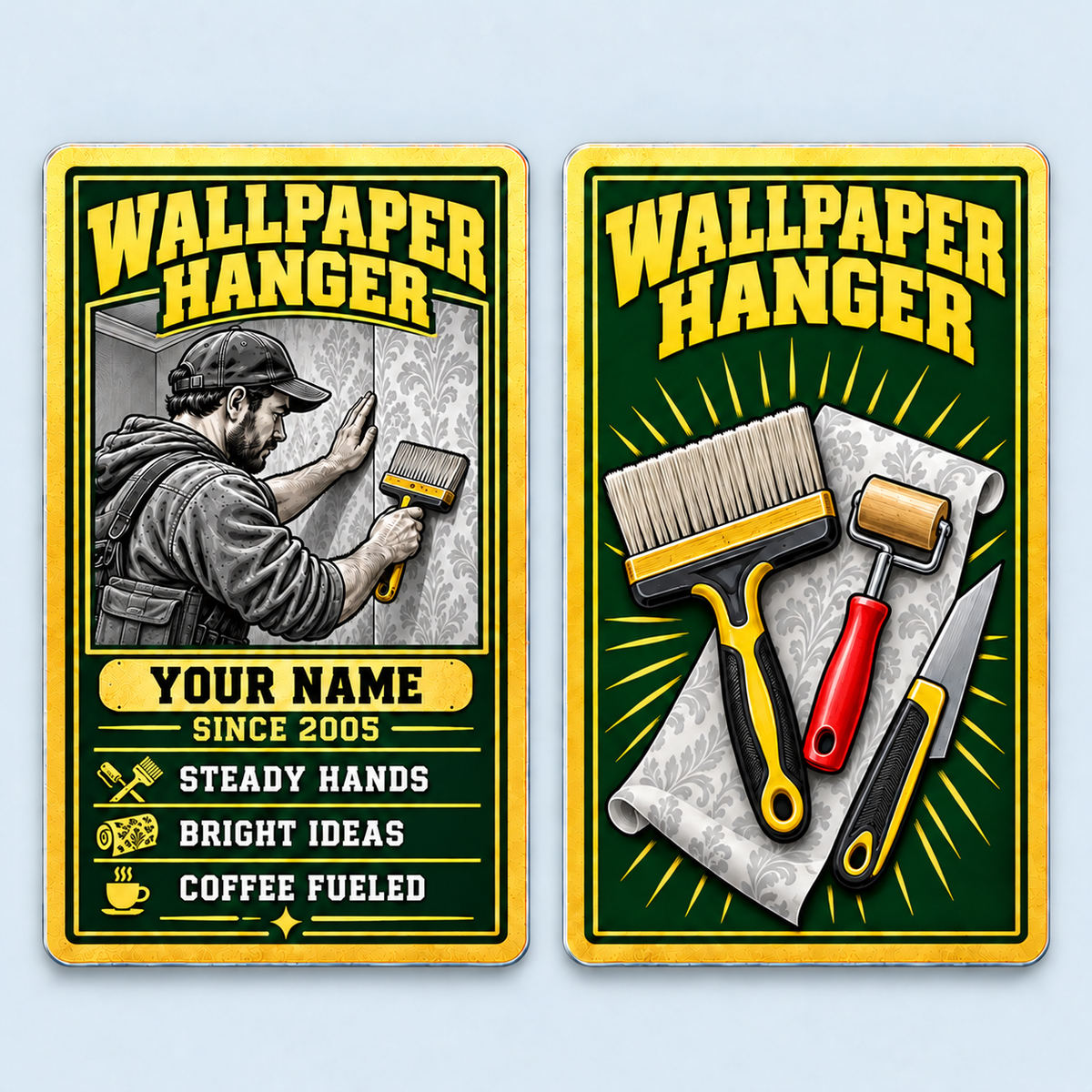 Front and reverse of one Wallpaper Hanger Trade Legend aluminum wallet card, with wallpaper installer illustration, brush, seam roller and trimming knife