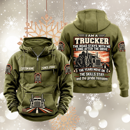 Trucker Skills and Pride Vintage Hoodie in Military Green, front and back views with sample text CUSTOM NAME and SINCE 2000, truck-and-road pouch graphic, and trucker portrait back artwork.