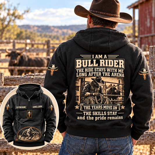 Back view of an adult cowboy wearing the Black Bull Rider Skills and Pride Vintage Hoodie at a ranch corral, with readable cream-and-gold rider artwork and a smaller matching front-view inset.