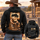 Adult cowboy wearing the Black Bull Rider Ready Every Day Portrait Vintage Hoodie beside a warm ranch barn, showing the bull and kneeling cowboy back art, with a smaller front view.
