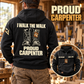 Black Carpenter Proud Walk hoodie with boot-pair back artwork in a woodworking workshop, plus a smaller front view.