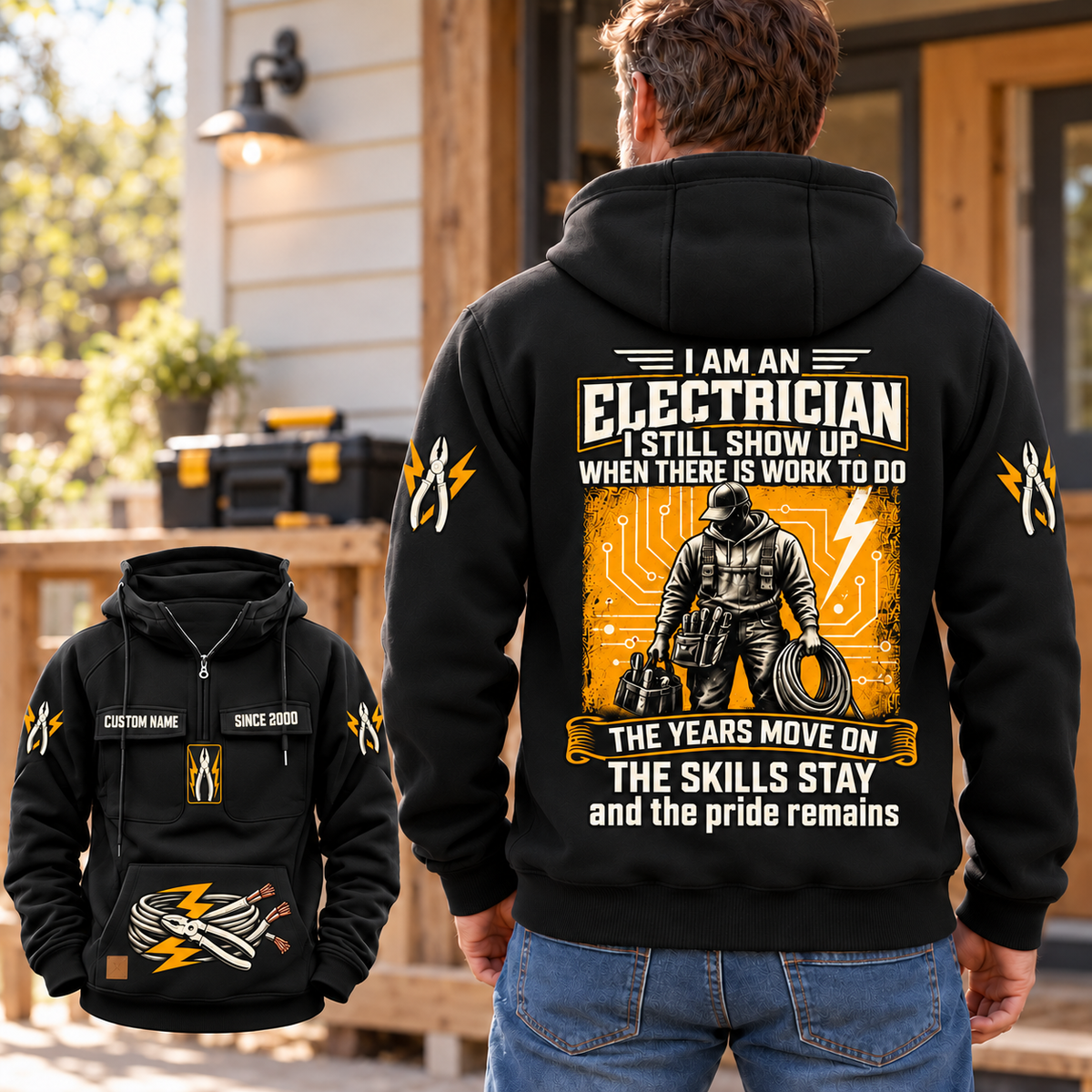 Black Electrician Skills and Pride Vintage Hoodie on a relaxed back-view model beside a home workshop doorway, with a smaller front inset, cream and yellow electrician artwork, CUSTOM NAME and SINCE 2000 details, and a closed toolbox in the background.