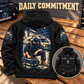 Black EMS Daily Commitment Portrait Vintage Hoodie on a station bench, showing the kneeling-worker back artwork and a smaller front inset with CUSTOM NAME and SINCE 2000.