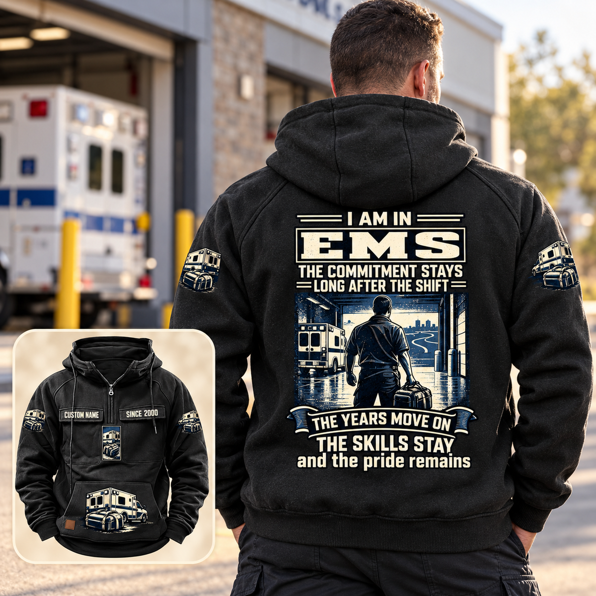 Black EMS Skills and Pride Vintage Hoodie worn from behind at a quiet ambulance station, with readable cream-and-navy back artwork and a smaller complete front-view inset.