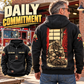 Gray-haired off-duty man wearing a black firefighter hoodie with a kneeling-firefighter back print, beside a station bench, with front inset.