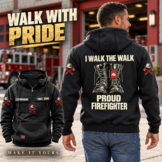 Black Firefighter Proud Walk Vintage Hoodie on an off-duty model outside a fire station, with boots-and-tag back artwork and a smaller front view.