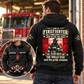 Black Firefighter Skills and Pride Vintage Hoodie on an off-duty model at a quiet fire station, showing the full back graphic and a matching front inset.