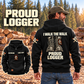 Black Logger Proud Walk Vintage Hoodie on an off-duty model at a timber yard, showing I WALK THE WALK boot artwork and a smaller front view.