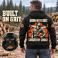 Black Logger By Choice Vintage Hoodie on an off-duty model at a timber yard, with readable back artwork and a smaller front detail inset.