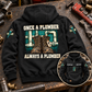 Black Plumber Once and Always Vintage Hoodie with boots and pipework back artwork on a plumbing workbench, plus a smaller front-view inset.