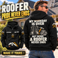 Roofer Never Ends Vintage Hoodie in Black, worn back view with front inset showing CUSTOM NAME and SINCE 2000 sample artwork, outside a shingle-roof home.