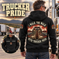 Black Trucker Walk the Walk Badge Vintage Hoodie worn at a parked-truck rest stop, showing boots-and-truck back artwork with a smaller front-view inset.