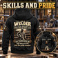 Black Welder Skills and Pride Vintage Hoodie, large back graphic and smaller front inset, with CUSTOM NAME and SINCE 2000 in a quiet metalworking workshop.