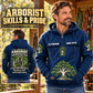 Arborist Skills and Pride Vintage Hoodie in Dark Blue, front right back card composition with faithful front and back artwork in a calm arborist equipment shed beside leafy trees.