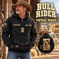 Bull Rider Daily Commitment Portrait Vintage Hoodie in Black, front left back inset composition with faithful front and back artwork in a weathered timber rodeo stable, outdoors.