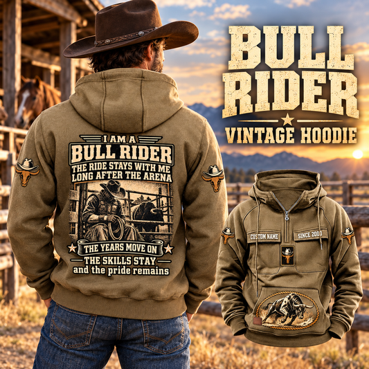 Bull Rider Skills and Pride Vintage Hoodie in Kaki, back left front cutout composition with faithful front and back artwork in a weathered timber rodeo stable, outdoors.