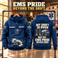 EMS Never Ends Vintage Hoodie in Dark Blue, paired front back composition with faithful front and back artwork in a calm station entrance with a parked ambulance softly out of focus.