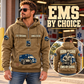 EMS By Choice Vintage Hoodie in Kaki, front left back inset composition with faithful front and back artwork in a calm station entrance with a parked ambulance softly out of focus.