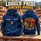 Logger Walk the Walk Badge Vintage Hoodie in Dark Blue, paired front back composition with faithful front and back artwork in a timber yard with stacked logs softly out of focus.