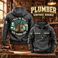 Plumber Walk the Walk Badge Vintage Hoodie in Dark Gray, back left front cutout composition with faithful front and back artwork in a tidy plumbing workbench with muted metal pipe fittings.