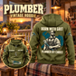 Plumber By Choice Vintage Hoodie in Military Green, back right front inset composition with faithful front and back artwork in a tidy plumbing workbench with muted metal pipe fittings.