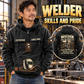 Welder Skills and Pride Vintage Hoodie in Black, front left back inset composition with faithful front and back artwork in a tidy welding workshop, no active welding or sparks.