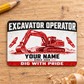 Front of the Red Monochrome Craft Excavator Operator aluminum wallet card on a pale wood surface.