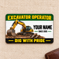 Front of the Green Band Excavator Operator aluminum wallet card on cream woven fabric.