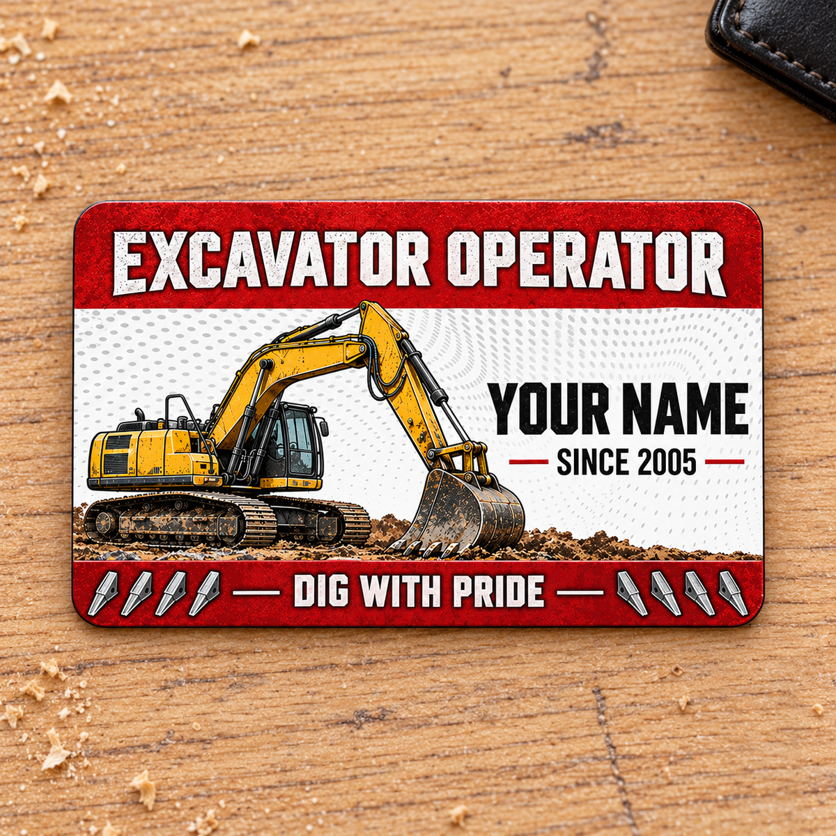 Excavator Operator Red Header aluminum wallet card front on pale oak.