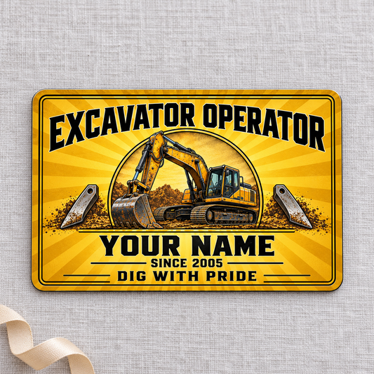 Front of the Golden Milestone Excavator Operator aluminum wallet card on pale linen.