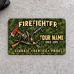 Front of olive camouflage Firefighter aluminum wallet card with helmet and crossed tools on light gray concrete.