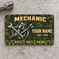 Front of Mechanic Rugged Field aluminum wallet card on pale gray concrete.