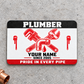 Plumber Red Monochrome Craft aluminum wallet card, front design on gray concrete.