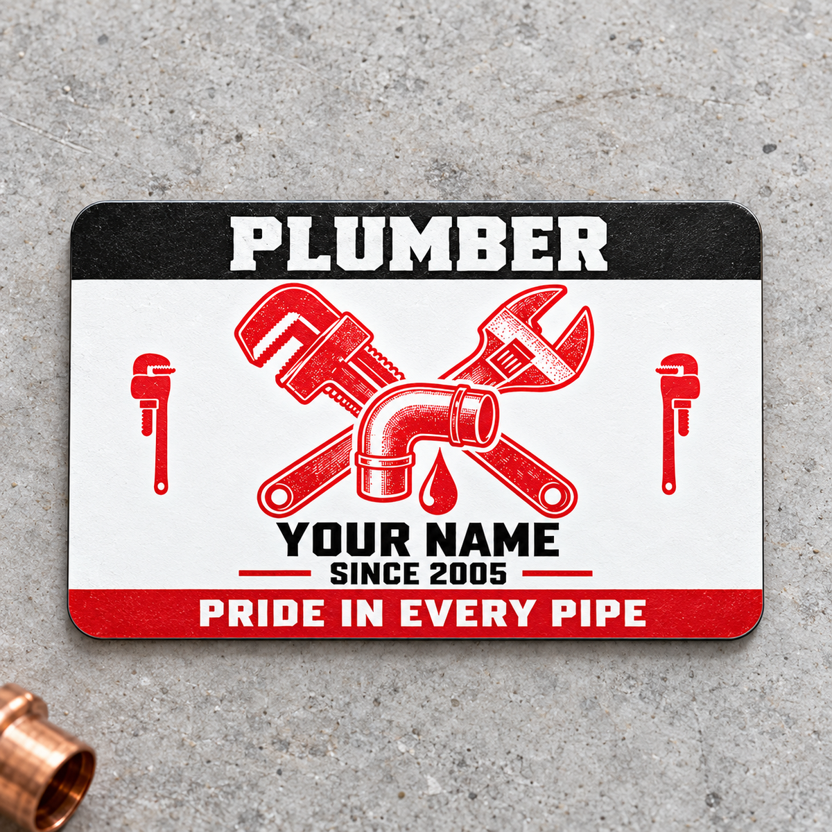 Plumber Red Monochrome Craft aluminum wallet card, front design on gray concrete.