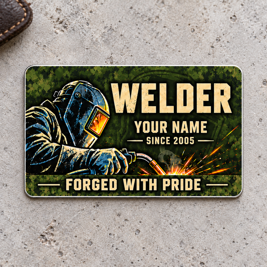 Welder Rugged Field aluminum wallet card front on pale gray concrete