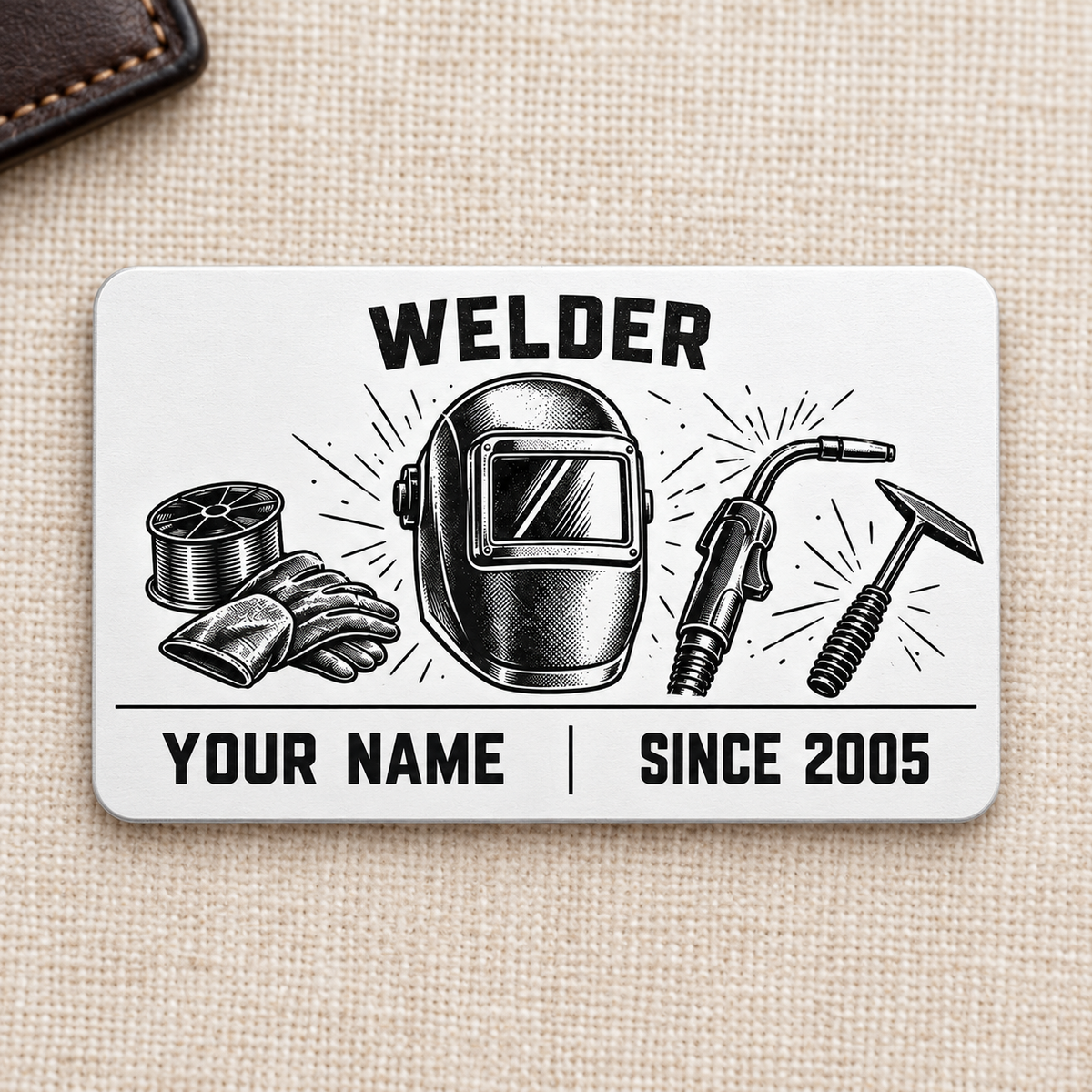 Welder Minimal Tool Grid aluminum wallet card front on cream linen