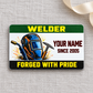 Welder Green Band aluminum wallet card front on gray linen with cream ribbon