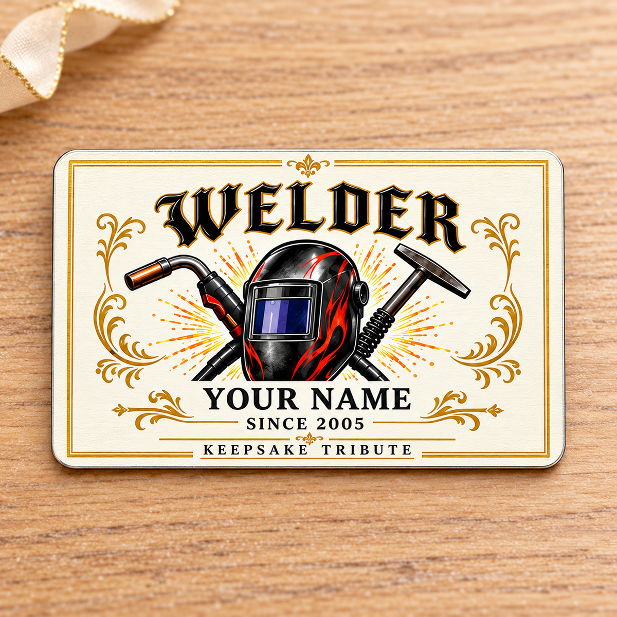 Welder Ivory Heritage aluminum wallet card front on pale oak