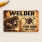 Welder Sepia Legacy aluminum wallet card front on cream linen