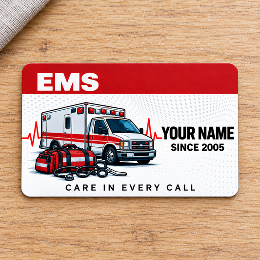 EMS Red Header aluminum wallet card, single front with ambulance and response tools on pale oak.