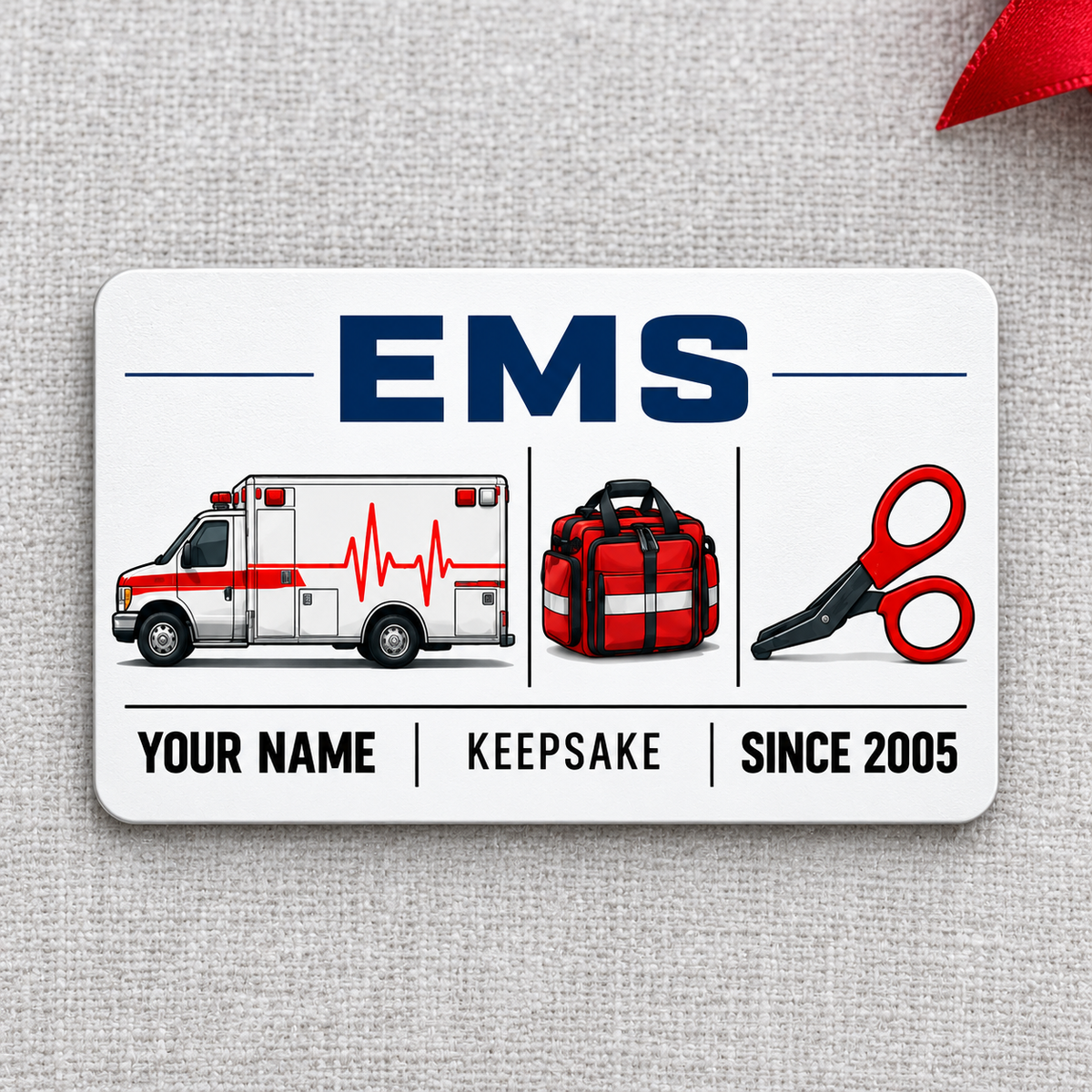EMS Minimal Tool Grid aluminum wallet card, single front with ambulance, medical bag and shears on pale gray linen.