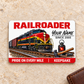 Railroader Signature Classic aluminum wallet card, front face on cream stone beside a brown wallet.