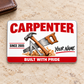 Front of the Carpenter Signature Classic aluminum wallet card on a pale warm stone surface.