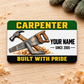 Front of the Carpenter Green Band aluminum wallet card on a light wooden work surface.