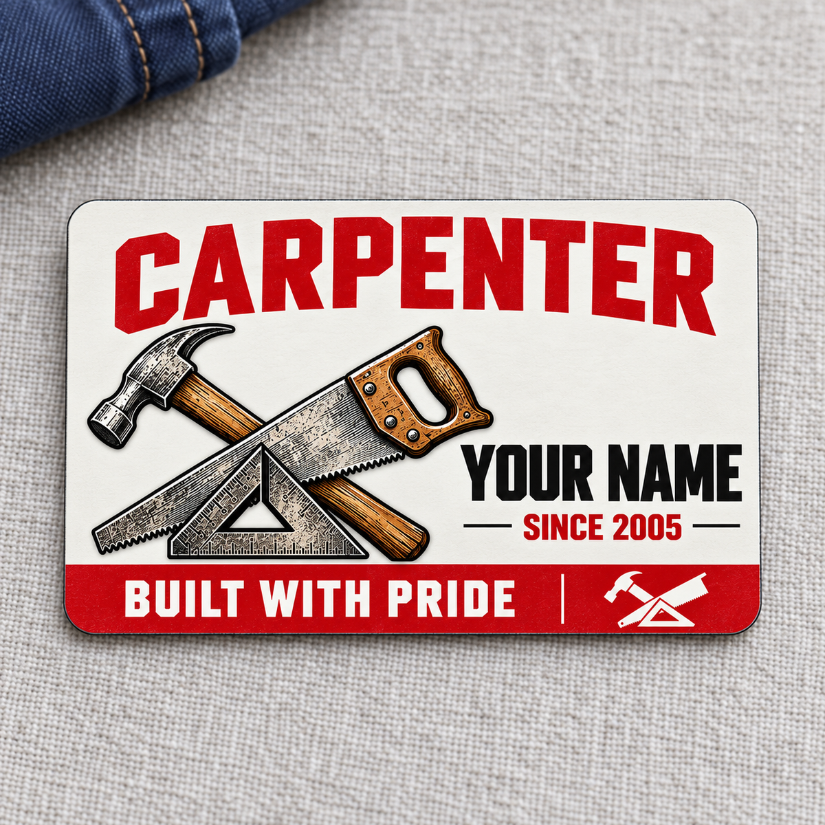 Front of the Carpenter Signature Modern aluminum wallet card on gray linen.