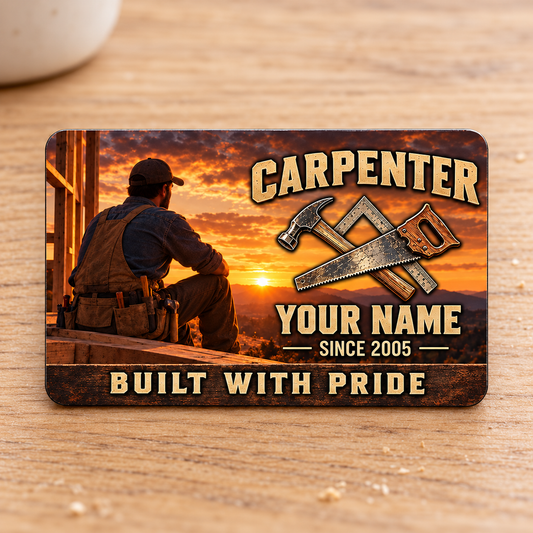 Front of the Carpenter Sunset Workday aluminum wallet card on a light oak tabletop.